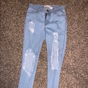 High waisted holy jeans